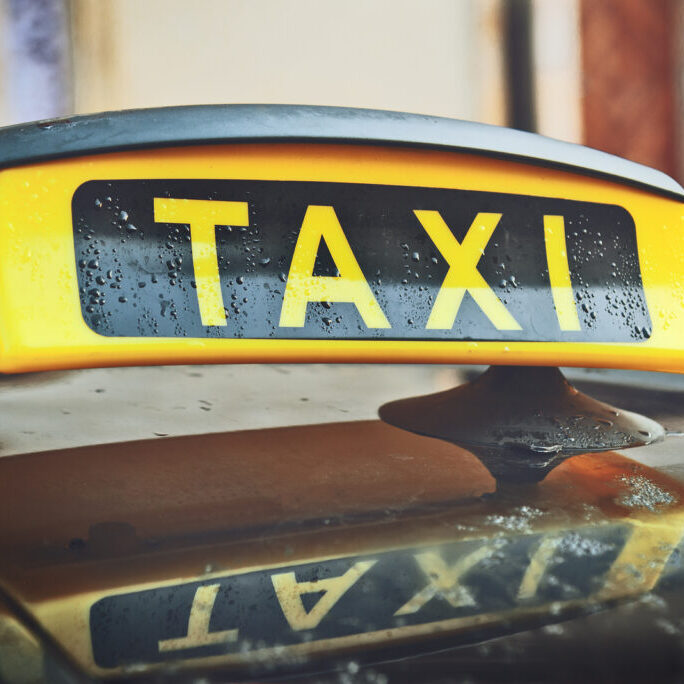 a wet taxi roof sign